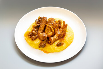 Traditional and rustic Brazilian dish, free-range chicken with polenta. Real food