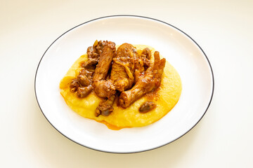 Traditional and rustic Brazilian dish, free-range chicken with polenta. Real food