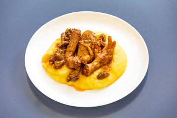 Traditional and rustic Brazilian dish, free-range chicken with polenta. Real food