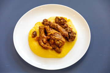 Traditional and rustic Brazilian dish, free-range chicken with polenta. Real food