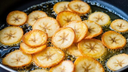 Fried banana slices cooking process home kitchen food photography warm environment close-up view culinary delight with banana insights