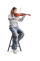 Female teenager sitting on a chair and playing a violin