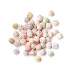 Heap of uncooked colorful tapioca pearls close up isolated on white background