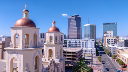 Tucson Arizona, USA: The old St. Augustine Cathedral in visual contrast against the corporate buildings of downtown.
