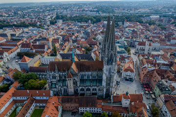 Naklejka premium Beautiful aerial view of Regenesburg, its massive gothic St Peter cathedral, the Danube river and the Old Stone Bridge