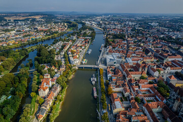Obraz premium Beautiful aerial view of Regenesburg, its massive gothic St Peter cathedral, the Danube river and the Old Stone Bridge