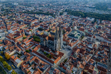 Beautiful aerial view of Regenesburg, its massive gothic St Peter cathedral, the Danube river and the Old Stone Bridge
