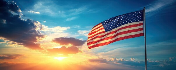 American flag waving against a bright blue sky with clouds