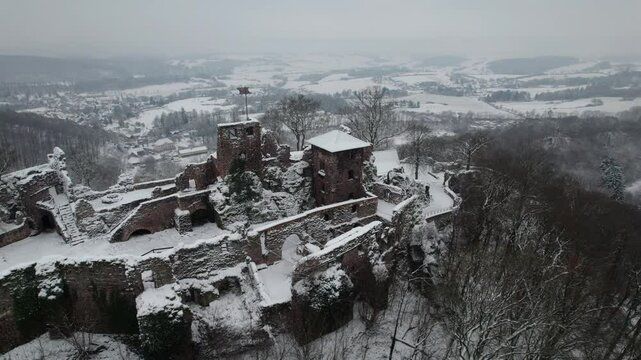 Aerial view ruins of old castle. Winter. Ruin of Hohnstein Castle, Harz mountains, Germany.