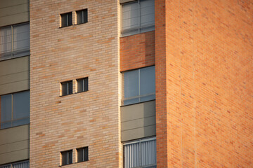 windows of a building and bricks