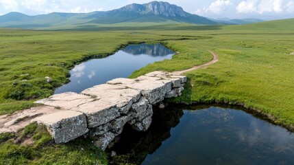 Fototapeta premium Scenic Stone Bridge Over River Mountain Landscape Green Meadow