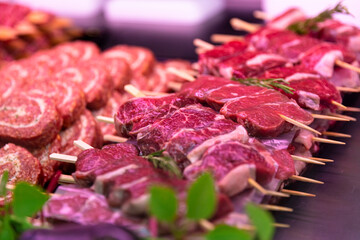 Lamb meat and row beef roll for grill or barbeque. Food industry meat for sale.