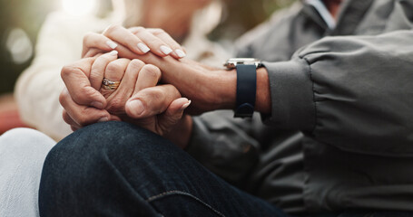 Senior couple, park and holding hands for bonding, support and marriage together outdoors....