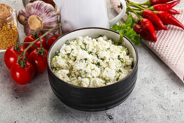 Curd cheese with green herbs