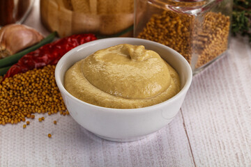 Dijon mustard sauce in the bowl