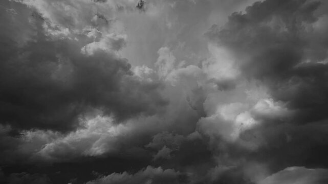 Storm clouds and lot of lightning during a thunderstorm. Dramatic clouds moving fast, 4k