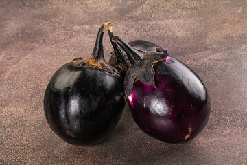Raw violet and black eggplant