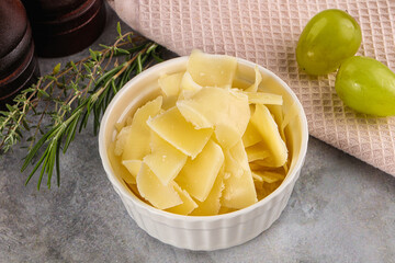 Parmesan cheese slices in the bowl