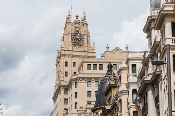 Fototapeta premium Old Luxury Residential Buildings in Gran Via and Barquillo area in Central Madrid