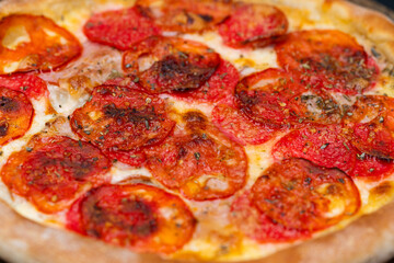 Italian pizza with tomatoes