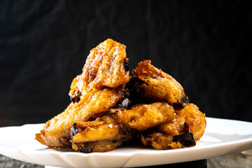 Fried eggplants with meat on a wooden background. Food concept. Chinese food.