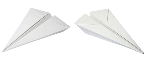 Paper airplanes folded from white sheets of paper
