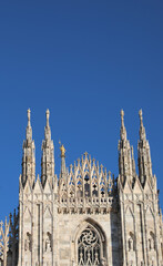 Detail of Facade of Cathedral of Milan also called DUOMO DI MILANO in italian language in gothic...