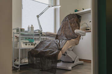 Specialized chair for conducting podiatric procedures in a beauty salon