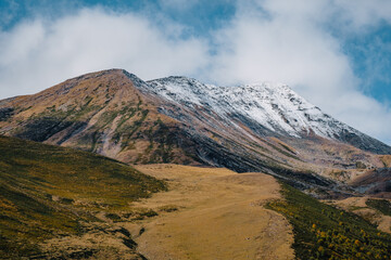 View on the snow covered mountains of Caucasus near Stepantsminda