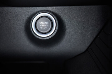 The image displays a detailed view of a cars start stop button
