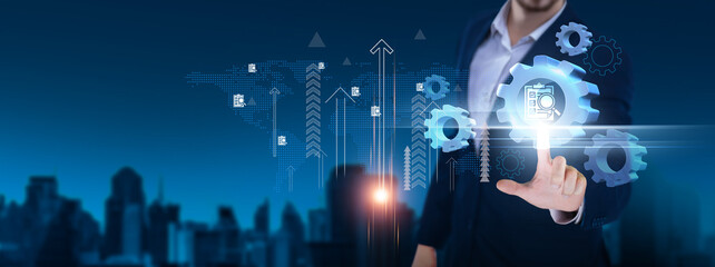 Assessment: Evaluation, analysis, feedback, performance, growth, appraisal, measurement, improvement. Businessman hand holds assessment icon and network on digital interface.