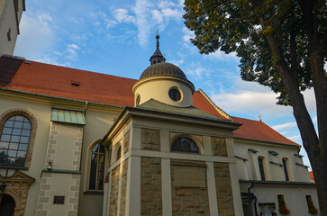 Cathedral of the Nativity of the Blessed Virgin Mary in Żywiec – a temple built in the fifteenth century with a high tower with a clock on it © Pawel Filusz