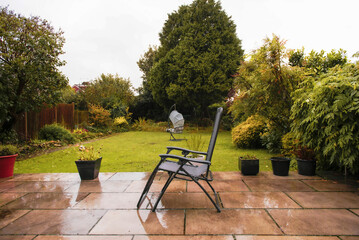autumn rainy view of the garden near the house in England