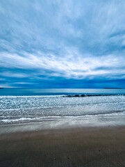 waves and clouds at the beach