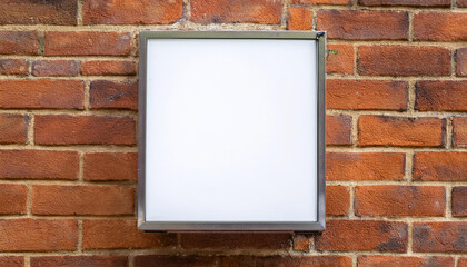 Mock up of light box advertising on brick wall background. Urban street.