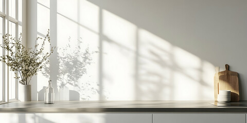 White kitchen interior with empty tabletop and sunlight casting shadows on wall perfect for photography. high quality image