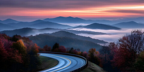 Blue Ridge Parkway in North Carolina with a damp road and early morning fog. high quality image