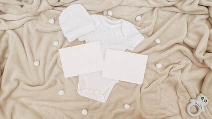 Adorable Baby Mockup with Blank Cards, White Onesie, and Cozy Beige Blanket – Perfect for Newborn Announcements and Baby Shower Invitations