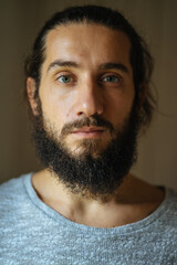 Obraz premium long hair man musician travel guitarist guitar with objects in the hands