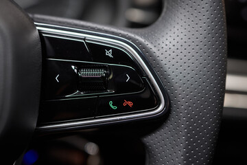 The modern cars steering wheel control panel boosts convenience and performance