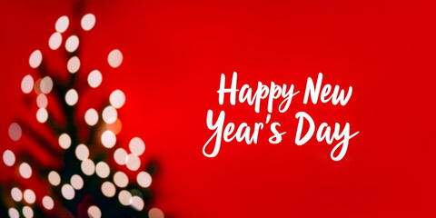 Naklejka premium Happy New Year's Day lettering text on solid red festive background with blurred Christmas tree with bokeh lights