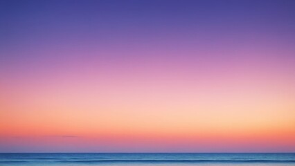 Tranquil sunrise over serene waters with distant mountains reflecting soft hues at dawn