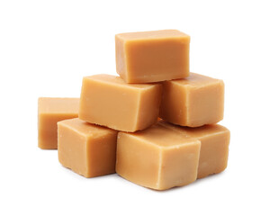 Tasty sweet caramel candies isolated on white