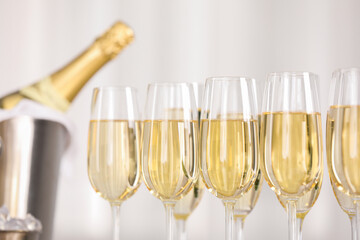 Champagne in glasses on light background, closeup
