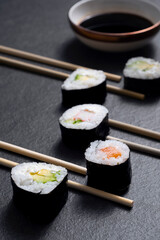 sushi with chopsticks