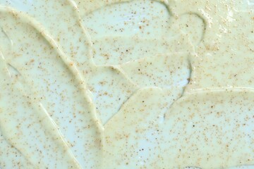 Sample of body scrub on light background, closeup