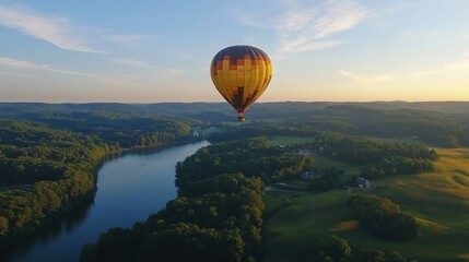 Fototapeta premium Serene Sunrise Hot Air Balloon Ride Over Lush Green Landscape