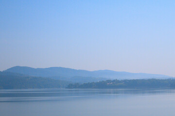 Breathtaking view of majestic mountains under a beautiful sky, where dramatic peaks meet the vibrant hues of the horizon