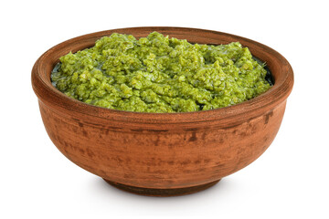 Pesto sauce in ceramic bowl isolated on white background