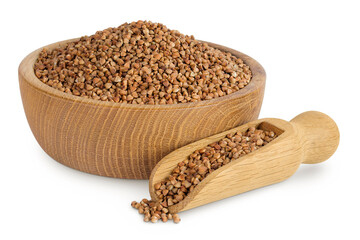 Raw buckwheat in wooden bowl isolated on white background